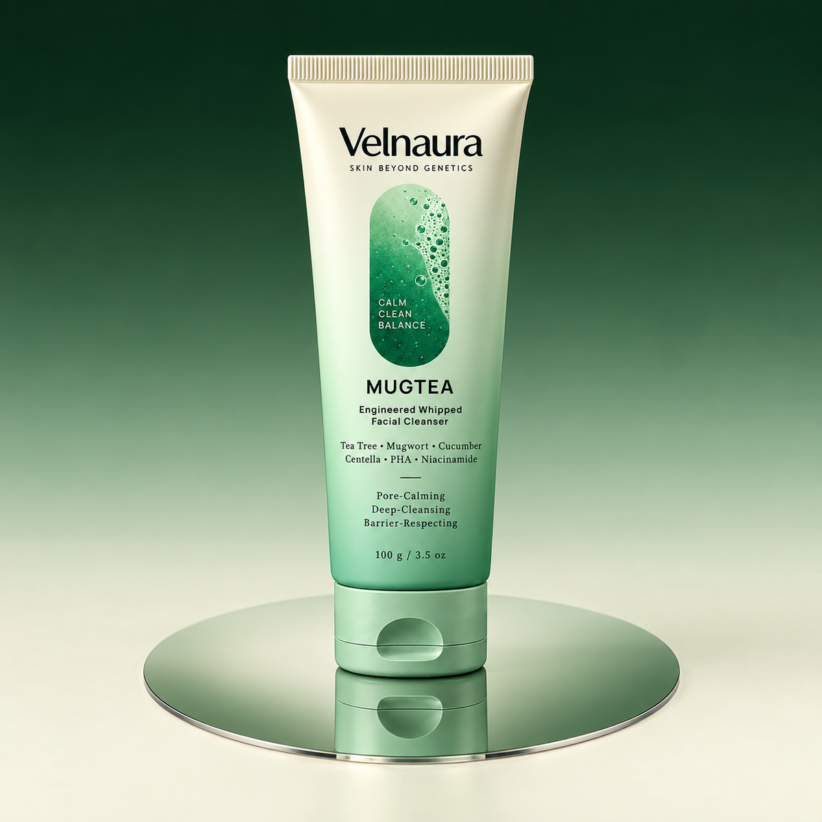 Mugtea facial cleanser tube is beautifully standing on the reflective surface against a top to bottom green to cream background
